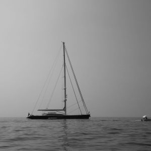 Sailboat off of the Amalfi coast, Italy enjoying the nautical life along with other boaters.