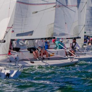 "Port! Going Against the Flow" A lone port-tacker approaches a fleet of right-of-way starboard