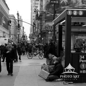 This image in black & white at the intersection of Seventh Avenue and 34th Street in Manhattan