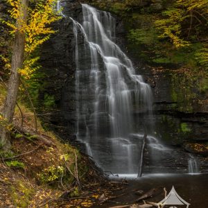 Bridal Veil Falls is located in the Bushkill Falls trail system. Here in autumn yellows on a cloudy