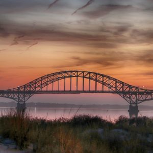 Fire Island Inlet bridge from Captree State Park at sunset.