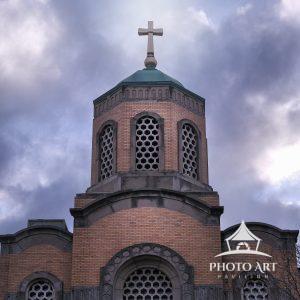 Beautiful old church in Queens, NY against the backdrop of amazing and textured clouds. Astoria,