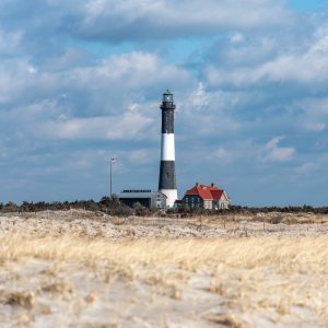 The iconic lighthouse at Fire Island from a beautiful winter day at the beach. The crisp coloring
