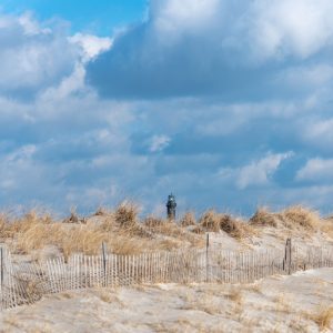 Beautiful day at the beach! You can see the Fire Island Lighthouse just peeking over the sand dune