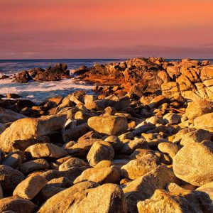 Sunrise on the Pacific Coast at Pebble Beach, California, USA.