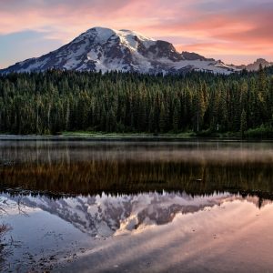 Mt. Rainier looms over Reflection Lakes ay sunrise. Mt. Rainier National Park, WA.
