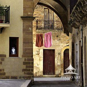 Sicilian Alley Cat 18 Sicily boasts many scenic alleyways among living quarters. The daily wash and house cats can be