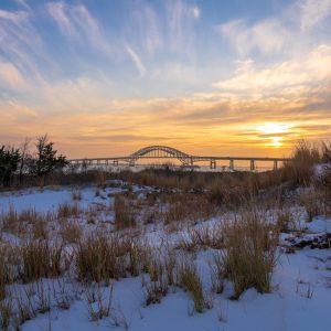 Fresh blanket of snow covering the beach for the  Solstice sunset.