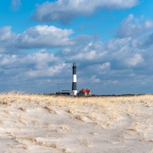 Beautiful day at the beach! You can see the Fire Island Lighthouse just peeking over the sand dune
