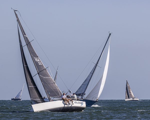 "Cloud 9" tacking upwind, crosses ahead of a competitor.