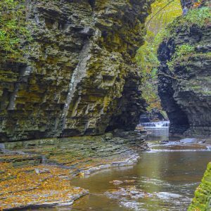 Waterfall hidden by rock formations. Watkins Glen State Park, Watkins Glen NY