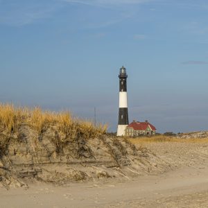 A large portion of the beach has been washed away immediately west of the Fire Island Light.