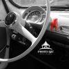Fiat and Lucky Charm 117 Interior of a true Italian car, the Fiat. Decorated with a lucky charm called, the Mano Cornuto. An