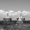 CHAPPAQUIDDICK BEACH CLUB – B&W 15 Beach huts of CHAPPAQUIDDICK BEACH CLUB, Martha's Vineyard.