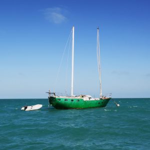 Green sailboat off the shores of Key West, Florida.