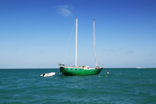 Green sailboat off the shores of Key West, Florida.