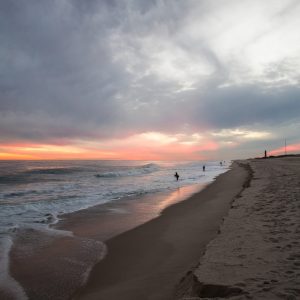 Fishermen in some very cold water at sunset at Robert Moses. What I like most about this photo,