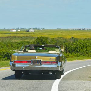 1969 Green Buick Electra crusing on the Loop Parkway. Long Island.