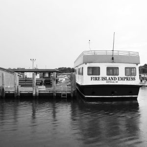 Fire Island Empress ferry boat  parked at Bay Shore marina and dock.