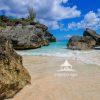 A surprisingly empty area of Horseshoe Bay Beach, Bermuda on a beautiful summer day. Many people