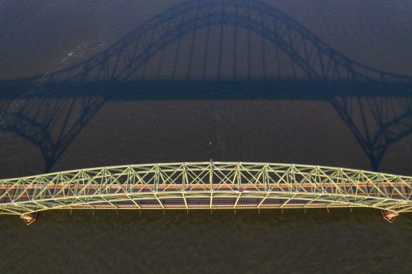 A drone shot of the Robert Moses Bridge that goes over the Great South Bay and connects Long Island
