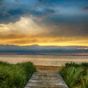 Beautiful sunset on Fire Island with a painterly look.