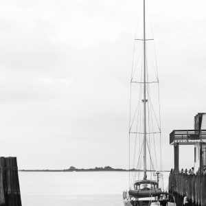 Summer Saturday evening. Sailboat docked at Port Jefferson Marina.