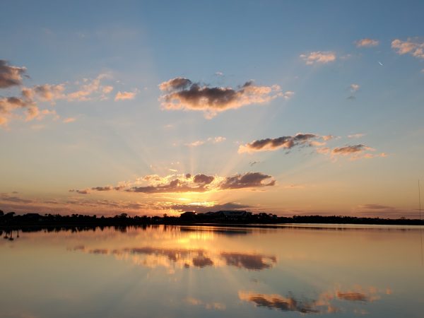 The sun and clouds reflecting onto this inland Lake in Babcock Ranch, FL offer this blessing, "May
