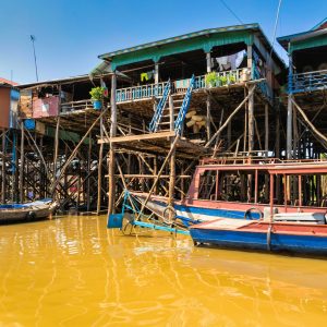 The stilt-pole village of Kampong Phluk looks at first glance like it was thrown together