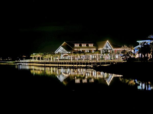The solar powered community of Babcock Ranch. The Town Center lights are reflecting along the Lake