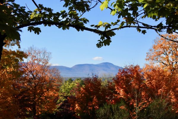 Fall foliage frames the Catskill Mountains