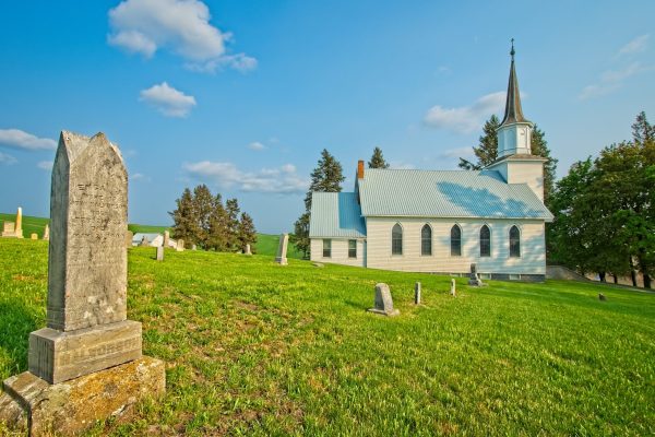 Active church and cemetery built in 1912.