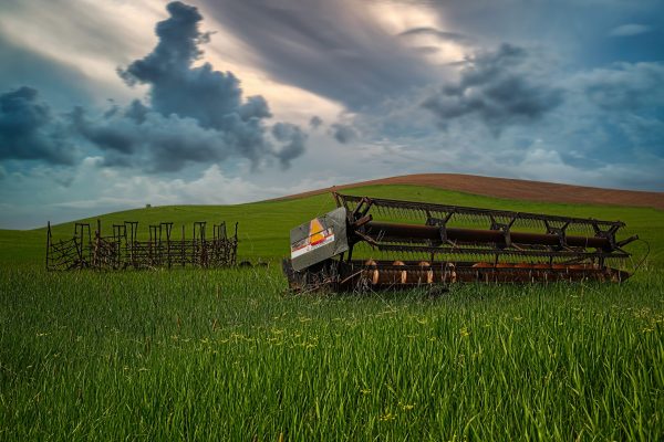 Farming equipment in field.