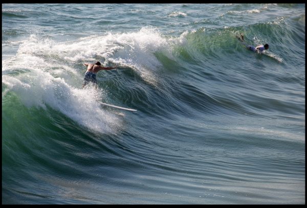 Surfers off Malibu in the Pacific Ocean