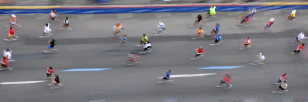 Looking down on runners in a race. A slow shutter speed was used.