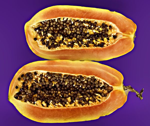 I cut the papaya into two halves to show the inside with all the seeds.
