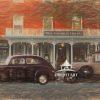 This photo painting depicts the facade of the hotel with vintage vehicles parked in front.