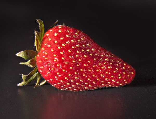 The close-up of the strawberry is to show the details  of the berry.