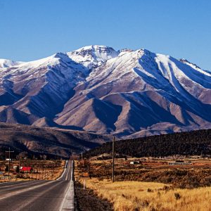 I was driving along the winding roads beneath the towering spine of the Wasatch Range when this