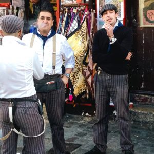 In the heart of Montmartre, Paris, a candid slice of life embodies a quintessential image of