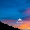 "Dawn's Embrace" is a stunning photograph capturing a serene landscape just before sunrise. The