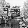 The essence of Amsterdam’s street life, this image blends the historic charm of Dutch canals,