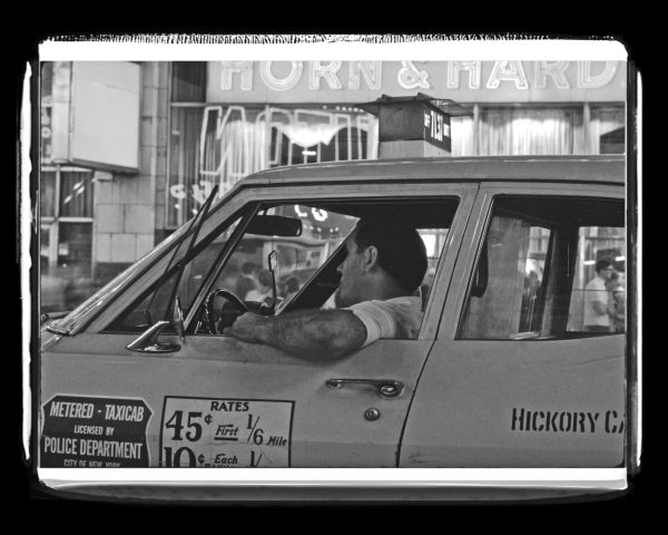 A New York City Cabbie drives by the Horn and Hardart automat, It was a self service restaurant that