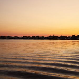 The water off the shore of Massapequa creating a ripple effect during golden hour. Long Island, NY.