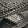This photo features an aerial view of the Brooklyn Bridge and its approaches The image highlights