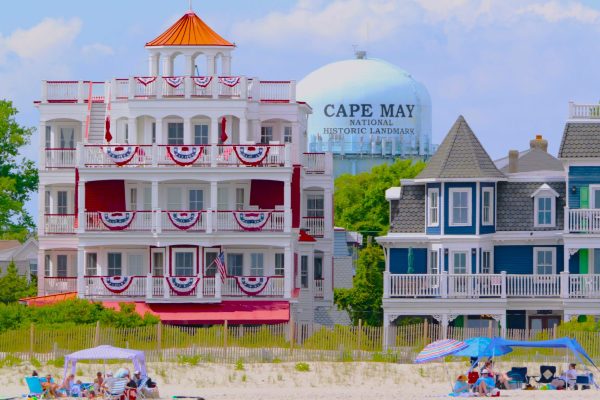 View of Historic Cape May Victorian Houses and Water Tower along the beach. Taken from a boat in