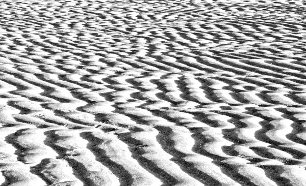 A pattern in the beach sand of Siesta Key Florida left by receding tide the Gulf of Mexico. HDR