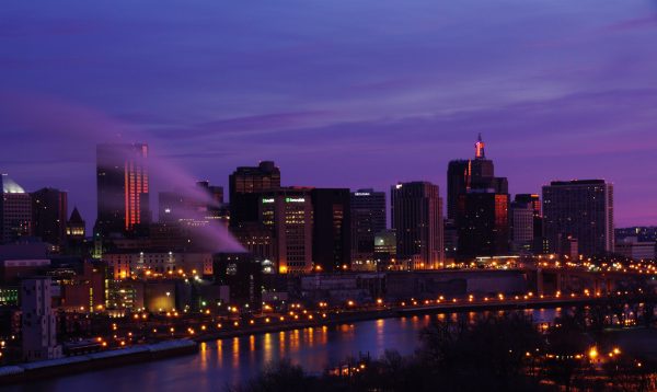 Predawn light on the City of St. Paul, Minnesota reflecting the purple and pink light on the