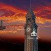 This is a photo of the Hoboken Lackawanna clock tower. It’s shown standing prominently against a