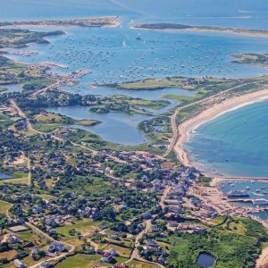 This is a photographic aerial view of Block Island Harbor. The image captures an expansive view of